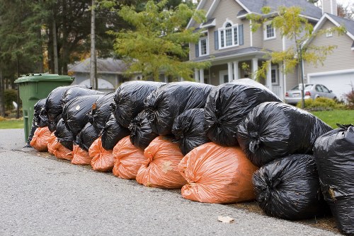 professional waste clearance team removing debris